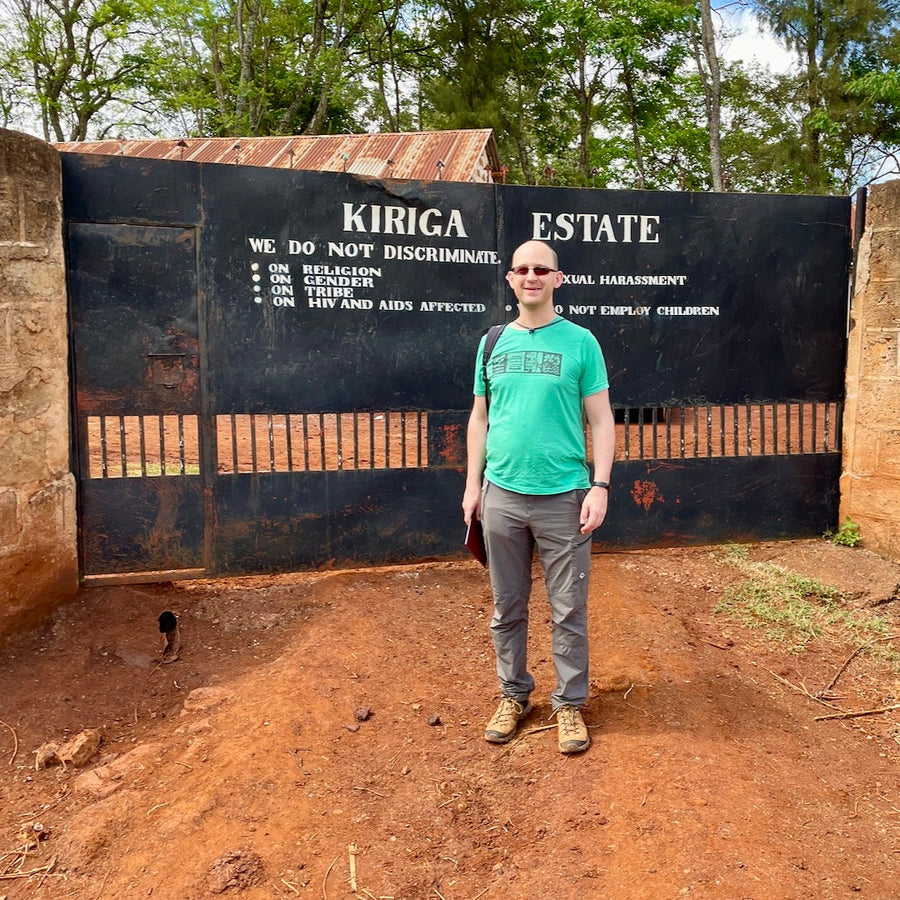 Hasbean Green Buyer Roland Glew at the entrance gates to the Kiriga Estate in Gatanga, Muranga, Kenya